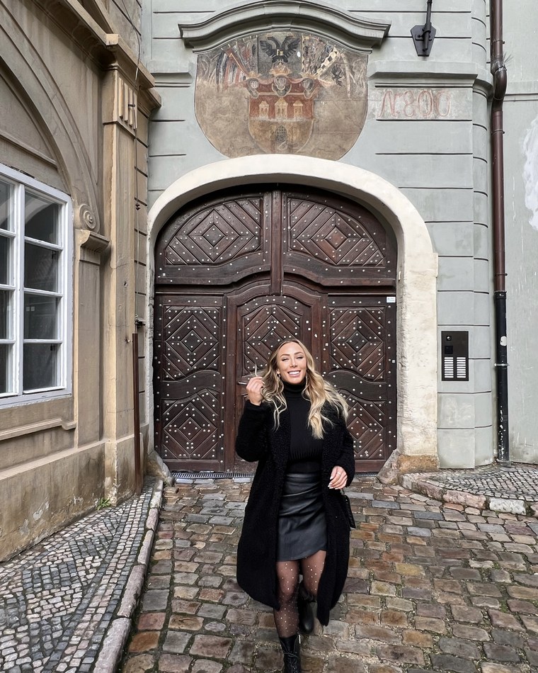 Amanda in a cobbled courtyard in Prague